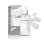 SKIN1004 Madagascar Centella Tone Brightening Capsule Ampoule 100ml – големо пакување ампула за изедначување на тенот со микро-капсули, ниацинамид и трансексамична киселина, во транспарентно шише со пипета и елегантна амбалажа. SKIN1004 Madagascar Centella Tone Brightening Capsule Ampoule 100ml – large-size ampoule for tone brightening with micro-capsules, niacinamide, and tranexamic acid, in a clear dropper bottle with elegant packaging.